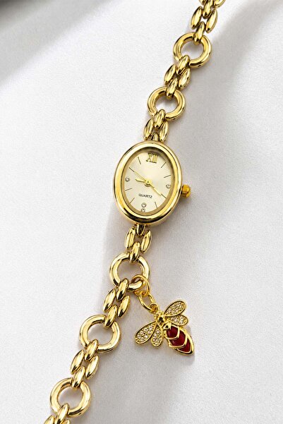 The Watch Women's Golden Yellow Oval Case Chain Watch with Red Stone Bee Figu...