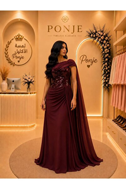 genric فستان سهرة فاخر بتصميم يجمع بين الرقي والأنوثة