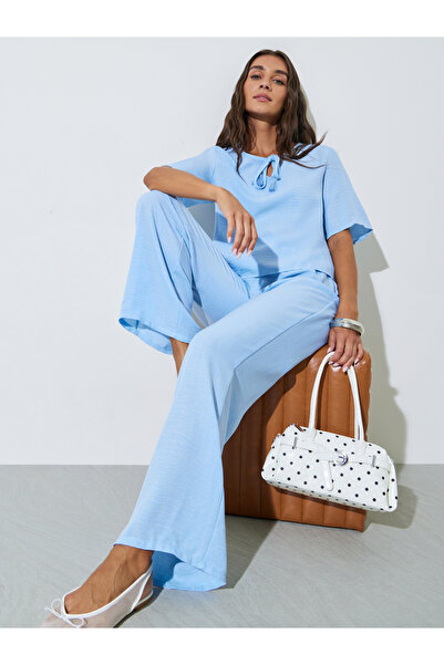 Styli Blue Solid Neck Tie Top and Wide Leg Pants Co-Ords