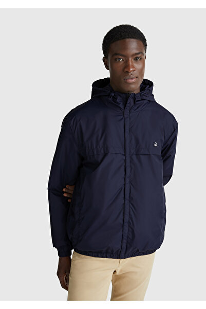 United Colors of Benetton Men's navy blue hooded rain jacket with logo detail...