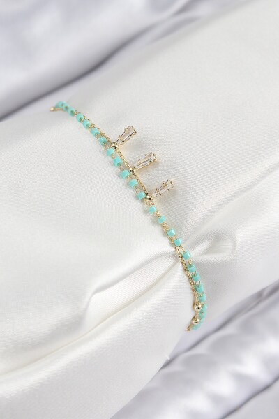 Inure Jewelry سوار نسائي من حجر الزركون الأزرق مطرز باللون الذهبي