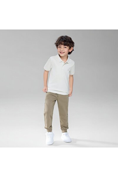 Giordano قميص بولو قطني بملمس سائل وقصة ضيقة للشباب