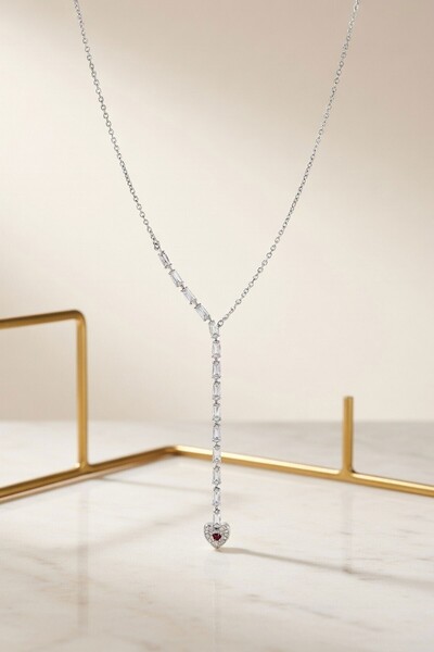 RMY MODA Women's Silver Zircon Stone Baguette Chain and Heart Figured Necklace