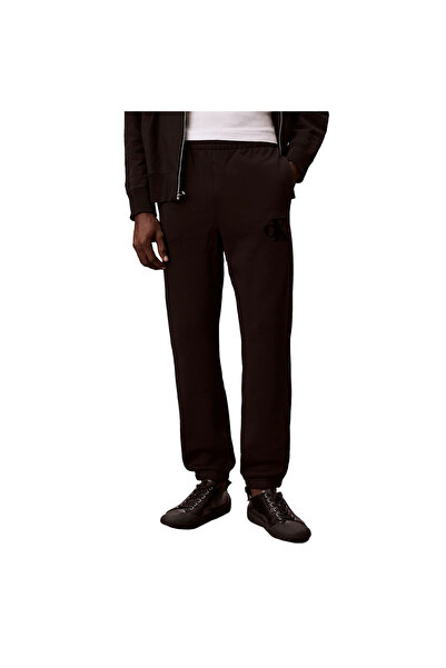 Calvin Klein Pantaloni de trening din fleece pentru bărbați cu aplicație cu l...