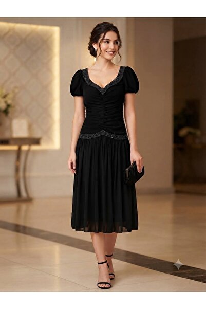 Pyramid masterpieces The Feminine Luxury Dress