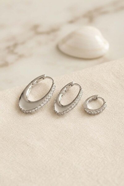 Inure Jewelry طقم أقراط فضية اللون بيضاوية الشكل مرصعة بحجر الزركون مكون من 3...