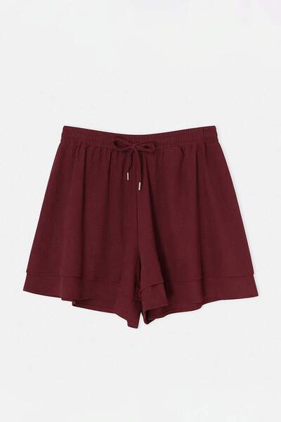 Trendyol Curve Pflaumenfarbener Rock mit weitem Bein, große Shorts und Bermud...