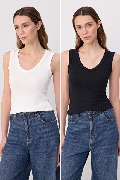 Trendyol Collection قميص داخلي محبوك ناعم بدون أكمام بياقة على شكل V وحزام سم...