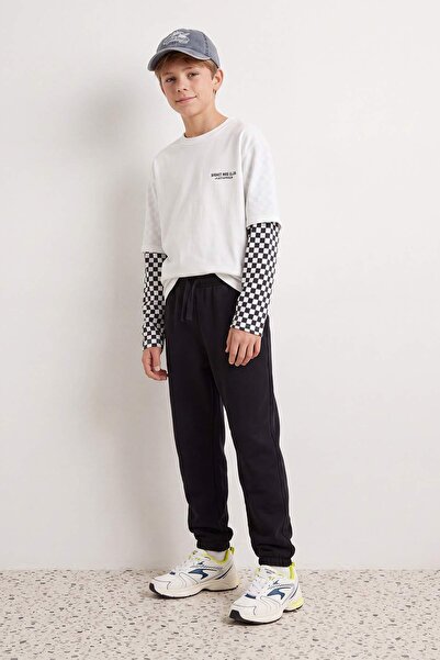 TRENDYOLKIDS Schwarze Jungen-Jogginghose TKDAW27EA00010