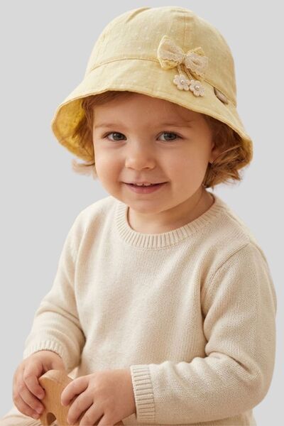 ww waka waka kids store قبعة دلو منقطة بتفاصيل فيونكة للأطفال والرضع