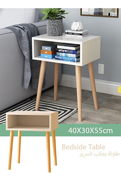table طاولة سرير بيضاء بتصميم بسيط مع مساحة تخزين وأرجل من الخشب الصلب، ومناس...