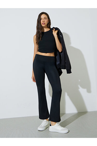 Styli Black Solid Flared Leggings