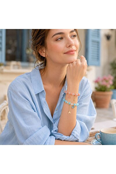 Ceyyiz Beaded Charm Bracelet with Coral and Blue Tones and Dangling Figure Design