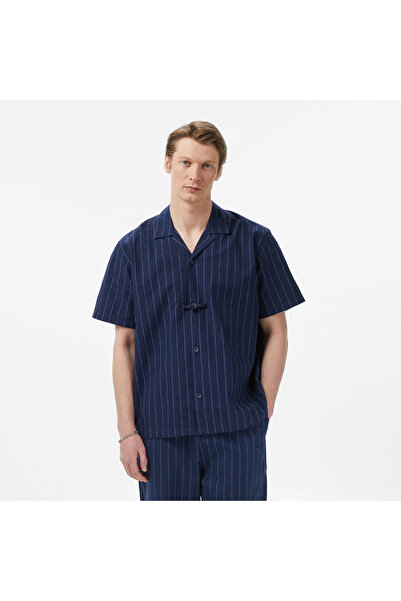 United4 قميص UNITED4 Comfort Fit للرجال باللون الأزرق الداكن