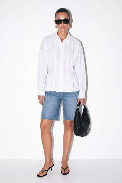 Drop by TrendyolMilla قميص أبيض مخطط مع تفاصيل مطوية على الظهر TDRSS26GO00116