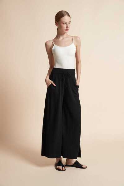 Yola Long wide trousers with pockets and waist tie