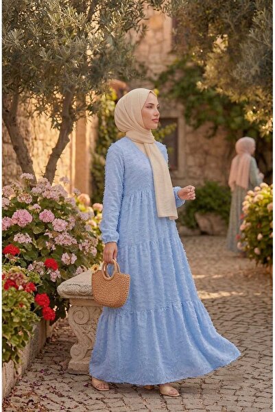 butik hira فستان محتشم بتفاصيل شرّابات