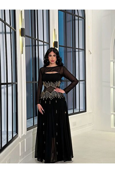 NALA FASHION الفستان اسود يبرز القوام بشكل أنثوي راقٍ بفضل المزج بين الشفافية...