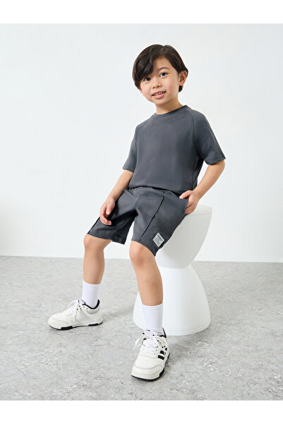 Styli Boys Raglan Sleeve T-shirt and Badge Detail Shorts Set