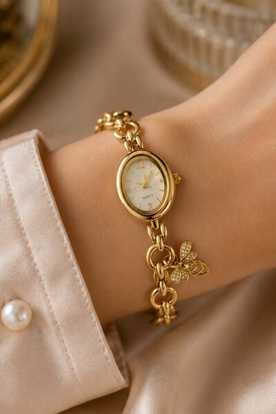 GANYMET Gress Women's Gold Bee Figured Charm Bracelet Watch White Dial Steel ...