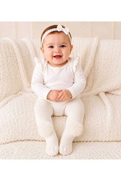 Baby by Bumbo جوارب طويلة مع إكسسوارات بوم بوم