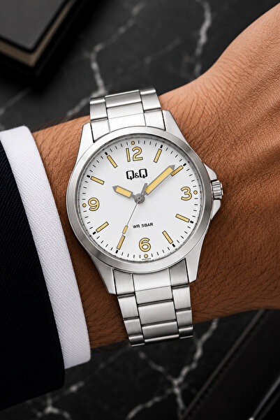 Q&Q Men's Silver Metal Cord White Dial 5 Bar Wristwatch with 2 Year Warranty