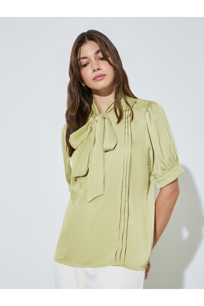 Styli Green Solid Tie-Up Neck Blouse With Pintuck Detail