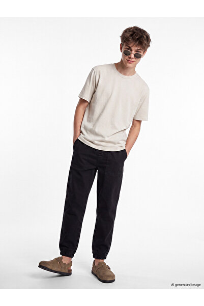 LC Waikiki بنطلون جينز للأولاد من NEVAVM Farkılık Jogger Fit