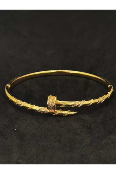 TAKI SANAT Kadın gold renk zirkon taşlı ikonik çivi model kelepçe
