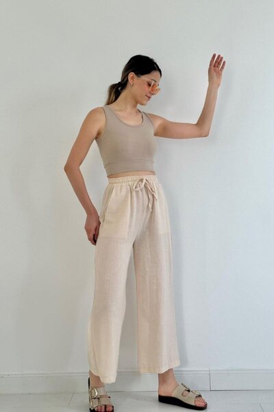 Gökyüzü Moda Beige linen trousers