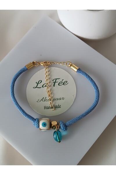 La fee aksesuar سوار نسائي أزرق اللون مصنوع من الخرز الزجاجي الأزرق على شكل م...