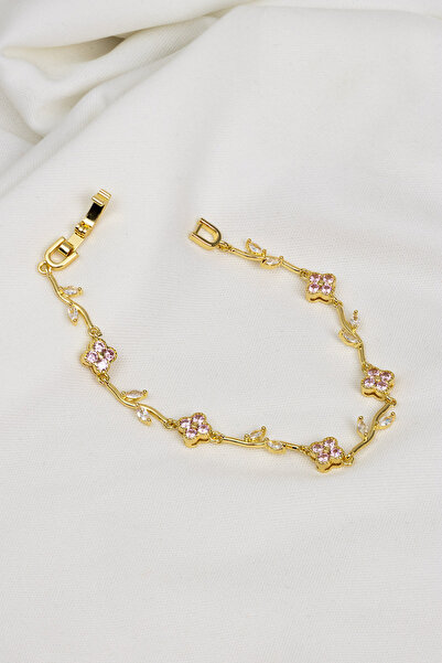 Süspüs Accessories سوار ذهبي اللون مزين بحجر وردي على شكل نبات البرسيم ذو الأ...