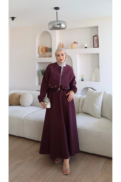 ZarülAAy fashıon Bomber jacket and skirt set with stone embellishments.