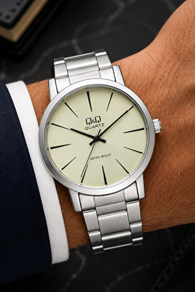 Q&Q Men's Silver Metal Cord Navy Blue Dial 5 Bar Wristwatch with 2 Year Warranty