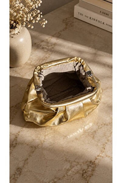 Swaggo collections Women's Leather Gold Clutch Bag