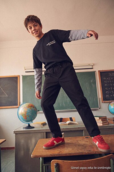 TRENDYOLKIDS Obične tkane pantalone za crnca TKDAW27PL00002