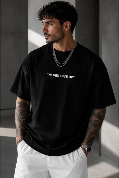 Clothify تي شيرت قطني كبير الحجم مطبوع عليه Never Give Up للجنسين، بأكمام قصيرة وياقة دائرية، مصنوع من القطن بنسبة 100%، مقاس كبير.