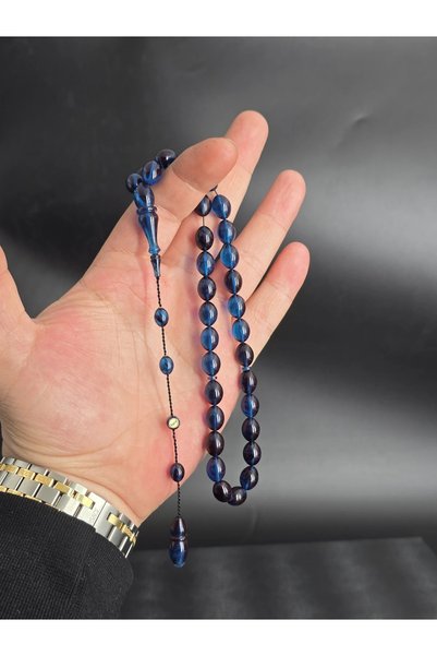 Tesbih-i Hazır Tesbihçilik Hareli Sıkma Kehirmen Amber Prayer Beads Stand Out with Their Skillfully Crafted Details and Elegant Design.