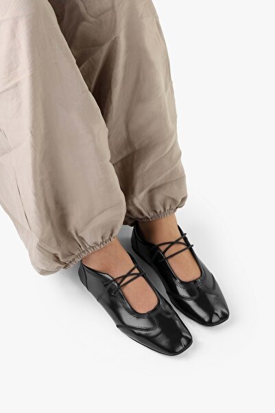 Shoeberry Women's Nuvia Black Leather Drawstring Ballerinas