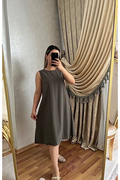 TENSEL KUMAŞ ELBİSE CEP DETAYLI MAXİ BOY