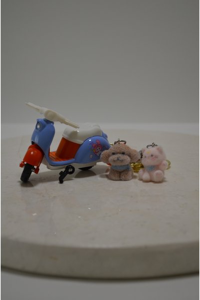 shop Colorful Motorized Bag Charm / Keychain with Dog and Cat Figures