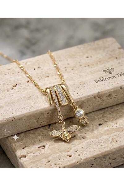 BEKLEMİN TAKILARI Xuping Kadın Zirkon Taşlı Arı ve Erkek Çocuk Figürlü Gold Ç...