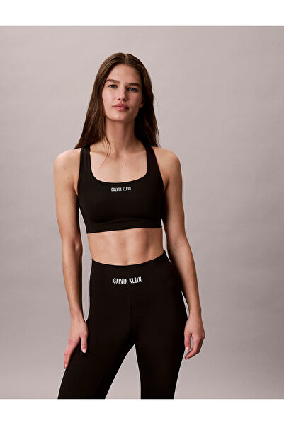 Calvin Klein Women's Cross Back Slim Fit Round Neck Stretch Fabric Black Spor...