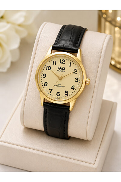 Q&Q Women's Wristwatch Gold Color Case Black Leather Strap Casual and Stylish...