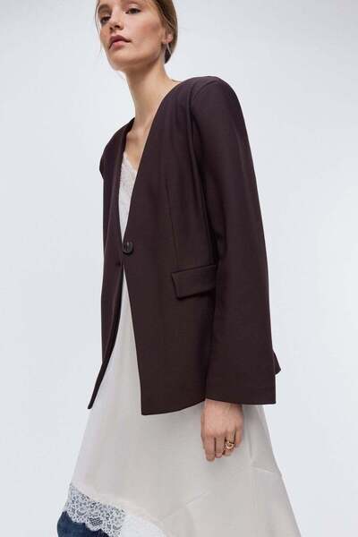 H&M بليزر من الجيرسيه بدون ياقة