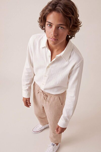TRENDYOLKIDS بنطلون للأولاد من القطن الخالص 100% بلون بيج TKDSS26PL00008