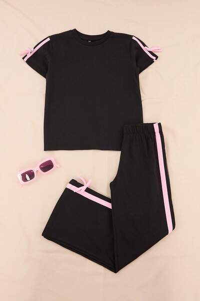 TRENDYOLKIDS Partea inferioară neagră tricotată simplă - Setul de sus TKDSS26...