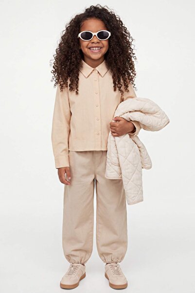 TRENDYOLKIDS Ecru Langarmshirt für Mädchen TKDAW27GO00002