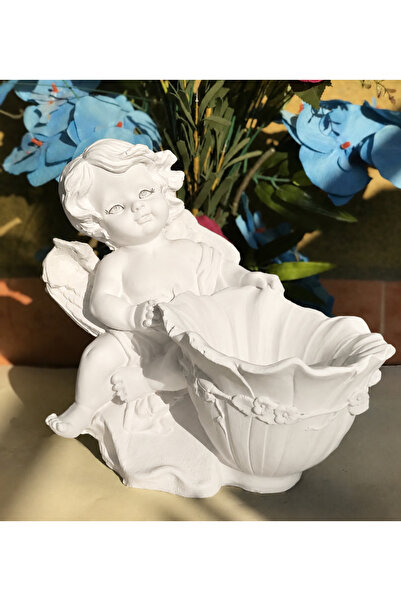 salda golu kumsalda Kaseli Melek Heykeli Kumsaldaa