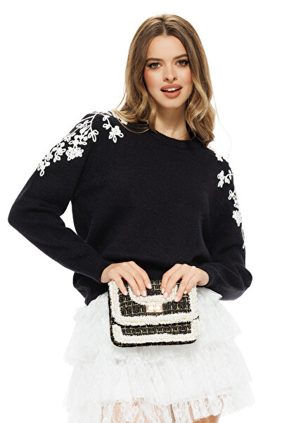 Fofy Elegant black women's sweater with white embroidery applied on the shoul...
